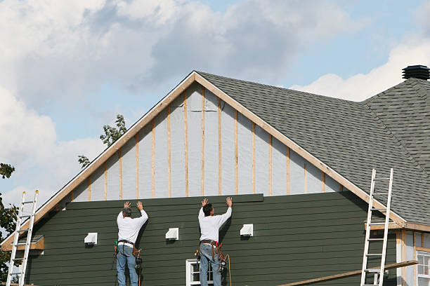 Professional Siding Contractor technician working in Westwood, PA